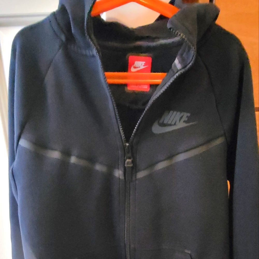 Youth boys nike tech hoodie with orange Nike t shirt.